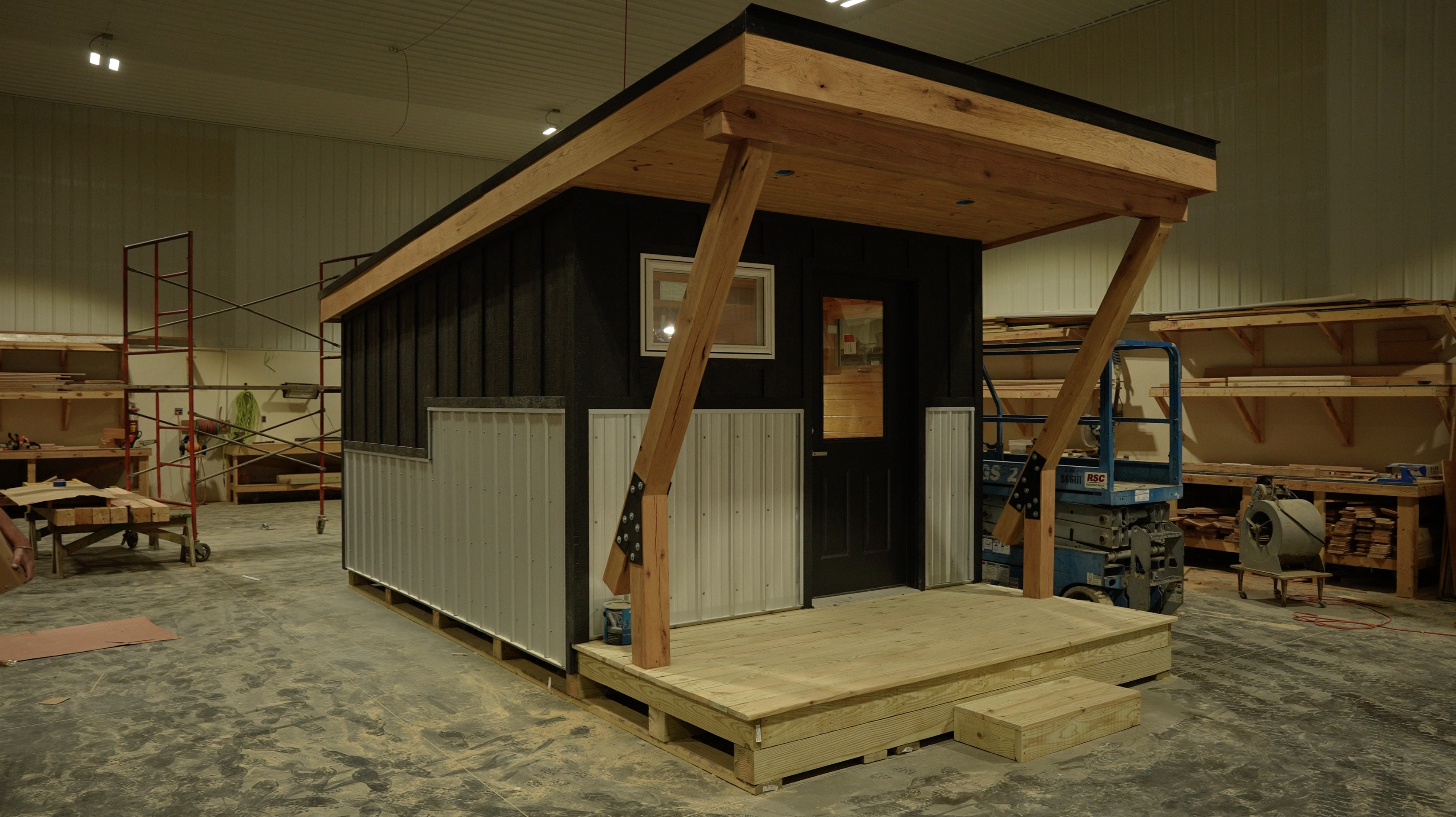 Tiny cabin in a warehouse